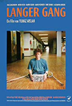 young boy with crutches kneeling on floor