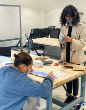 2 students working together at a table