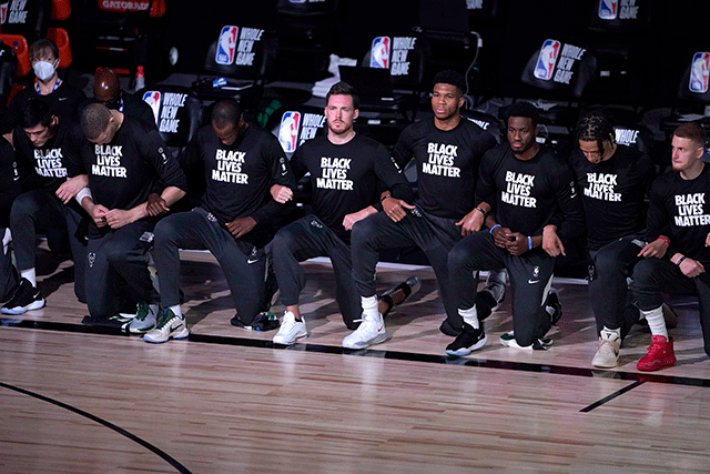 sports team wearing Black Lives Matter tshirts