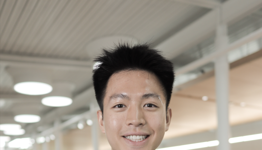 Sean Chang smiles for headshot in 